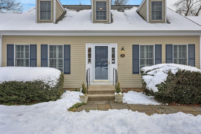 view of new england style home