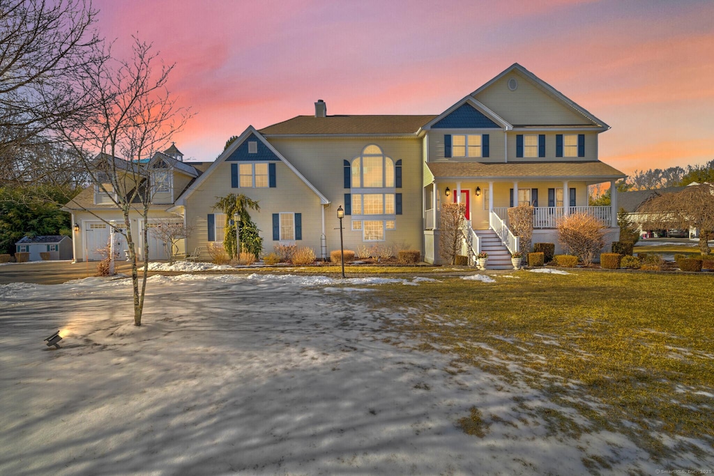 23 Merriman Ln, Wallingford, CT 06492 - view of front of property featuring covered porch and a chimney