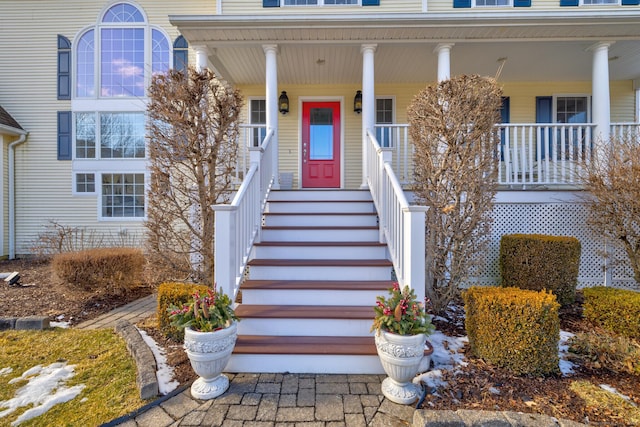 entrance to property with covered porch