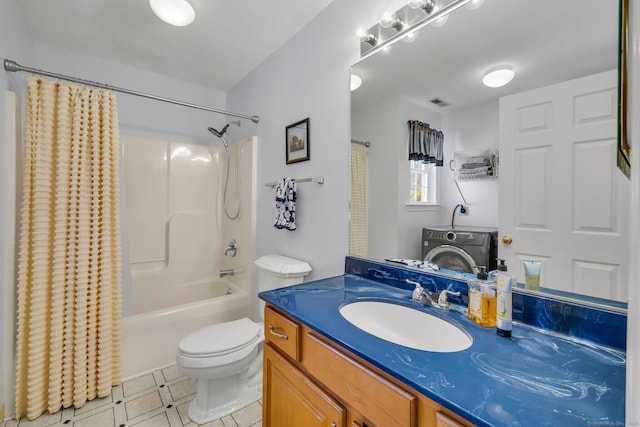 bathroom with shower / tub combo, washer / clothes dryer, vanity, and toilet