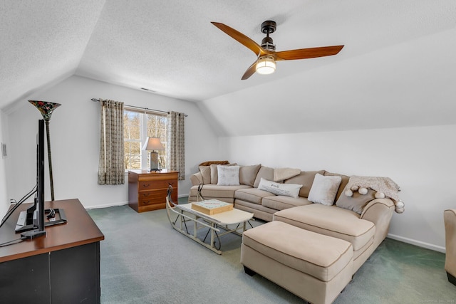 living area with a textured ceiling, vaulted ceiling, dark carpet, and baseboards