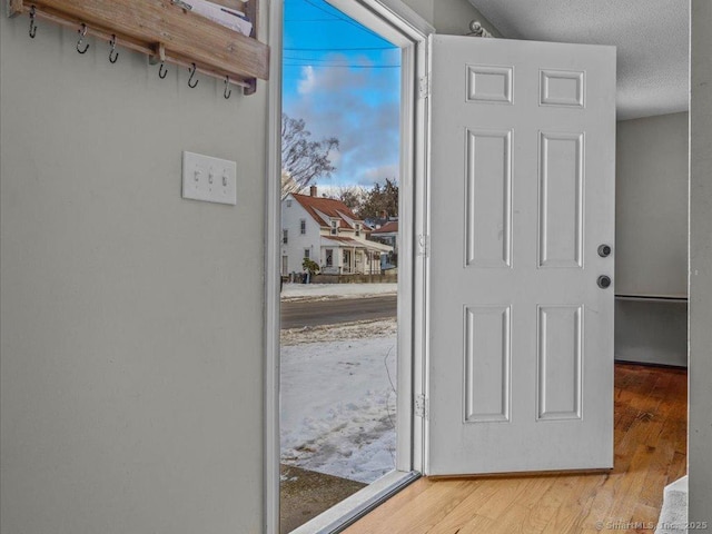 doorway featuring hardwood / wood-style floors