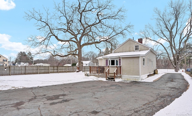 view of snow covered property