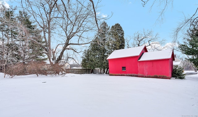 view of yard layered in snow