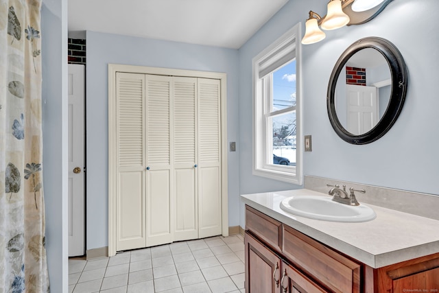 bathroom featuring vanity and tile patterned flooring