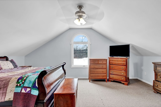 carpeted bedroom with lofted ceiling and ceiling fan