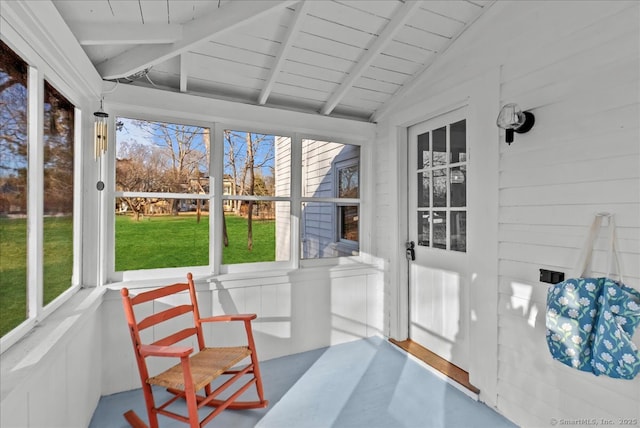 sunroom with vaulted ceiling with beams and wood ceiling