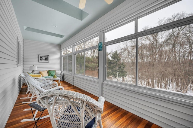 sunroom / solarium with ceiling fan