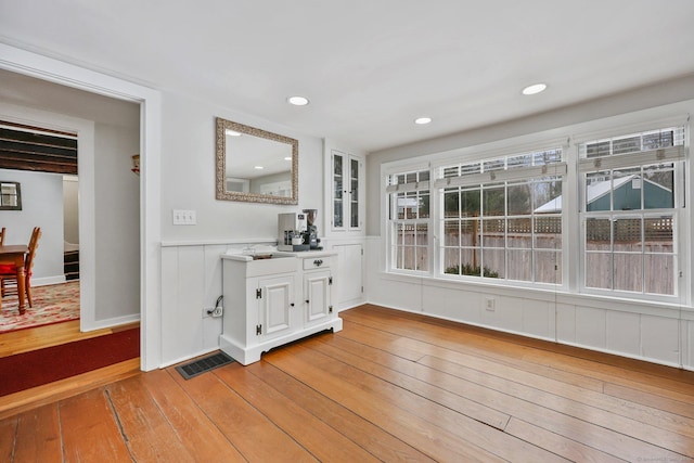 interior space with hardwood / wood-style floors