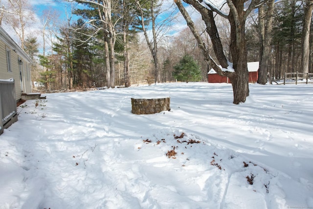 view of yard layered in snow