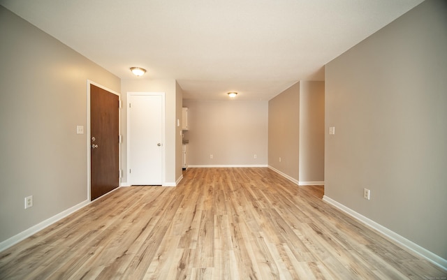 unfurnished room featuring light wood-type flooring