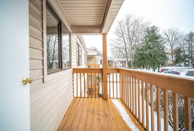 view of snow covered deck