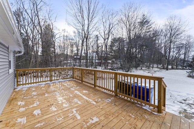 view of snow covered deck