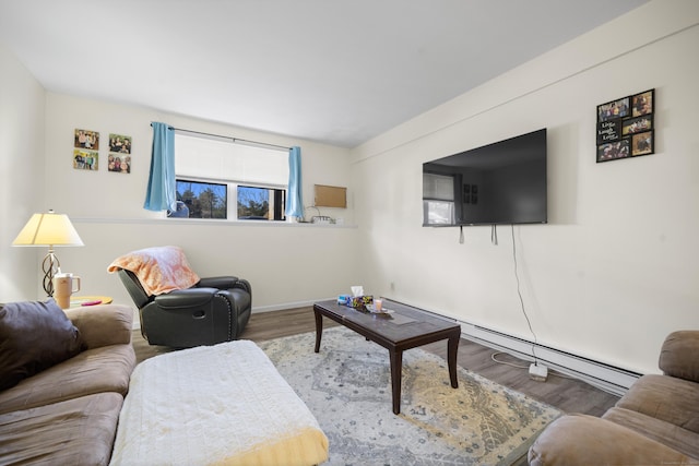 living room featuring hardwood / wood-style flooring and baseboard heating