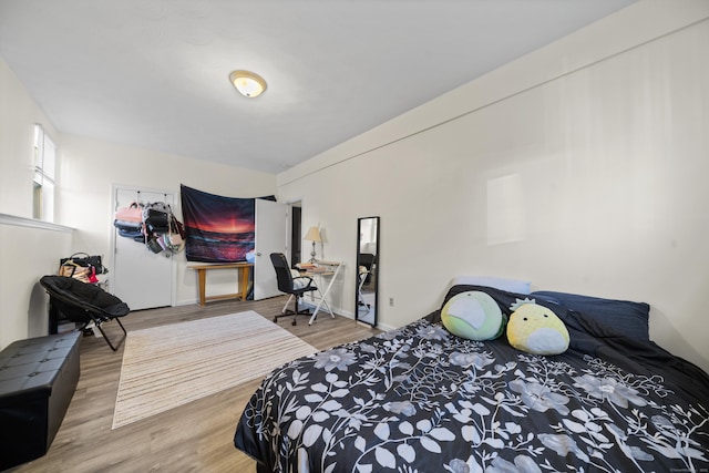 bedroom featuring hardwood / wood-style flooring