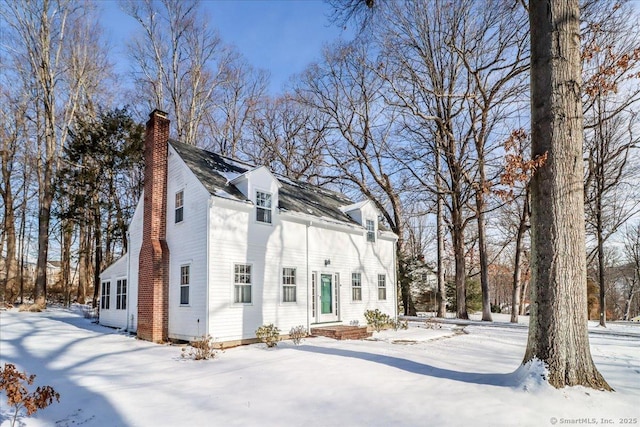 view of snow covered property