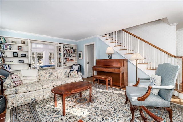 living room featuring crown molding