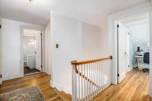 hall with light wood-type flooring