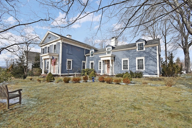 view of front facade with a front lawn