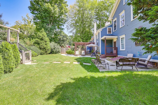 view of yard featuring a patio and a pergola