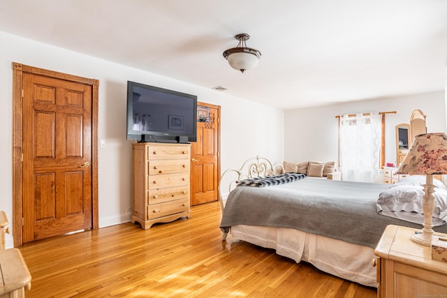 bedroom featuring light hardwood / wood-style floors