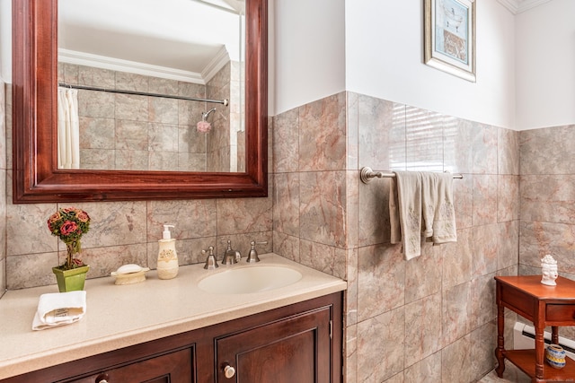 bathroom with vanity, ornamental molding, and tile walls