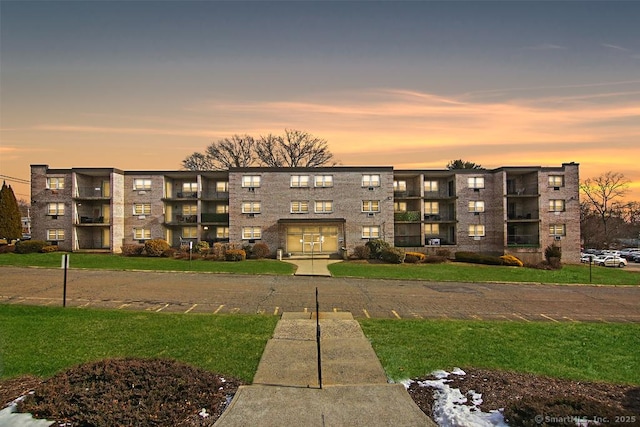 view of property at dusk