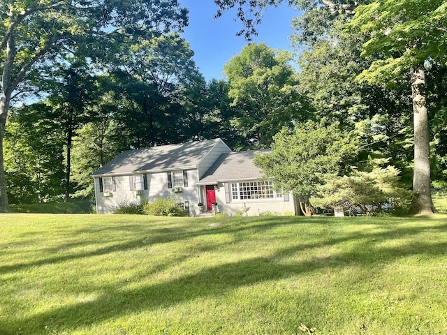 view of front of home with a front lawn