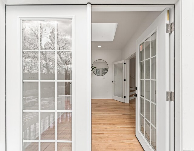 765 Durham Rd, Guilford, CT 06437 - hall featuring recessed lighting, french doors, baseboards, and wood finished floors