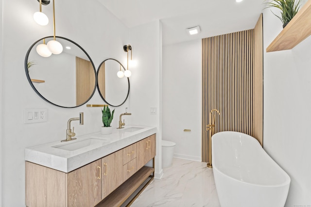 765 Durham Rd, Guilford, CT 06437 - bathroom with a sink, double vanity, marble finish floor, and a freestanding tub