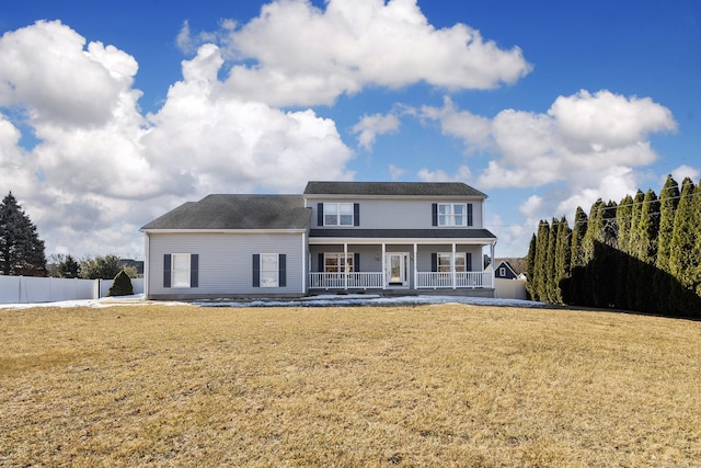 view of front of property with a front lawn and a porch