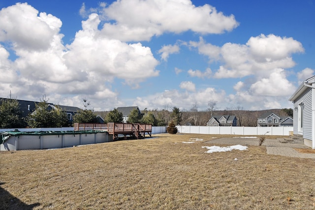 view of yard featuring a covered pool