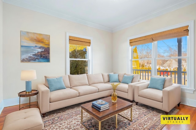 living room featuring hardwood / wood-style flooring and ornamental molding