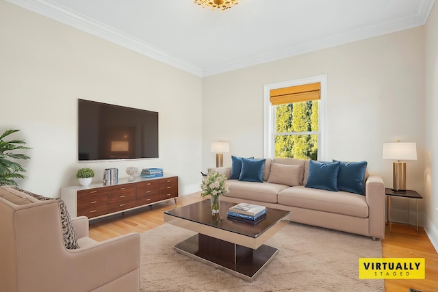 living room with light hardwood / wood-style flooring and ornamental molding