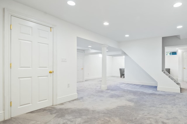 basement with light colored carpet