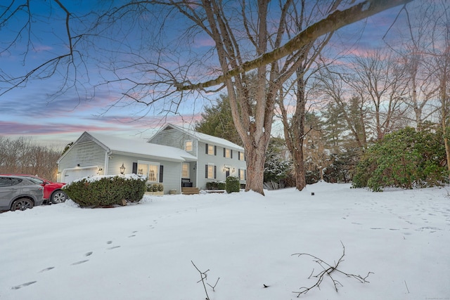 view of front of property with a garage