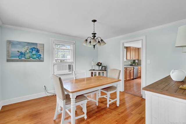 1379 Old N Colony Rd, Meriden, CT 06450 - dining area with ornamental molding, a chandelier, light wood-style flooring, and cooling unit