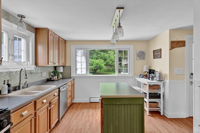 1379 Old N Colony Rd, Meriden, CT 06450 - kitchen featuring light wood-style floors, appliances with stainless steel finishes, decorative backsplash, wainscoting, and a center island