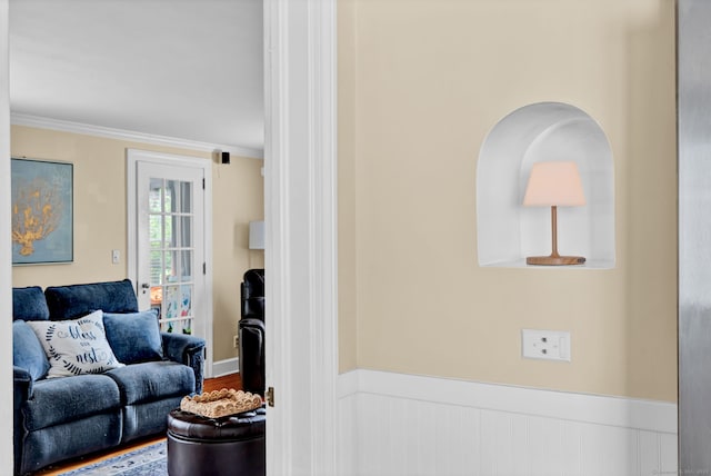1379 Old N Colony Rd, Meriden, CT 06450 - living area featuring ornamental molding, wood finished floors, and wainscoting