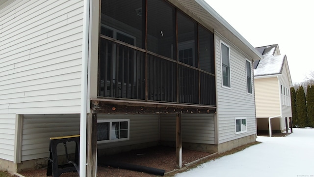 view of snow covered property