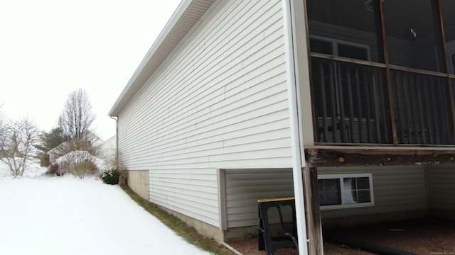 view of snow covered property