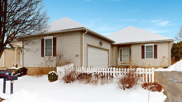 ranch-style home featuring a garage