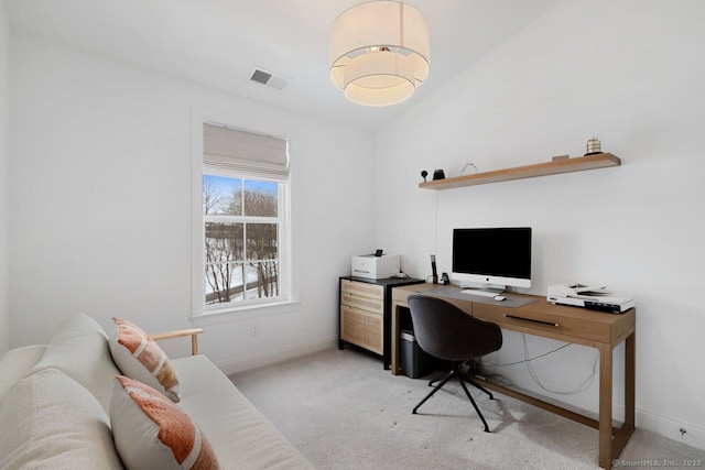 carpeted office space with lofted ceiling