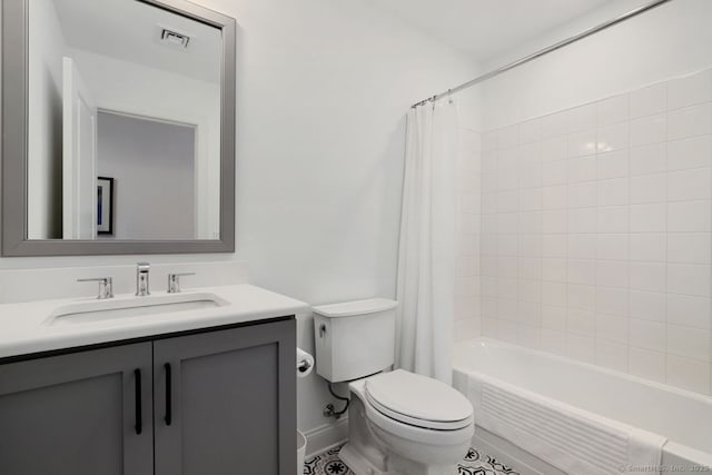 full bathroom featuring shower / tub combo, vanity, and toilet