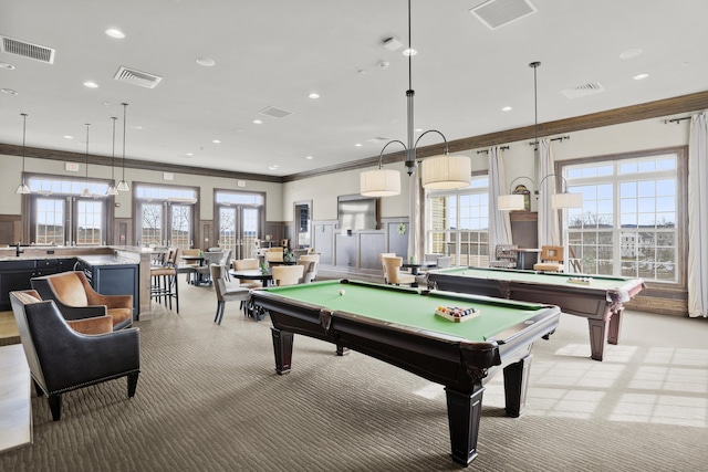 rec room with crown molding, a wealth of natural light, light colored carpet, and billiards