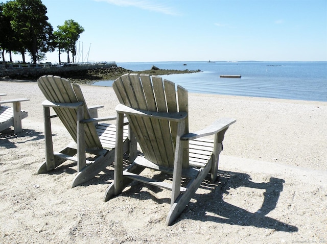 view of home's community with a view of the beach and a water view