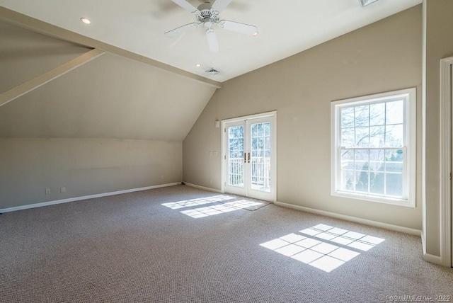 bonus room featuring lofted ceiling, light colored carpet, ceiling fan, and french doors