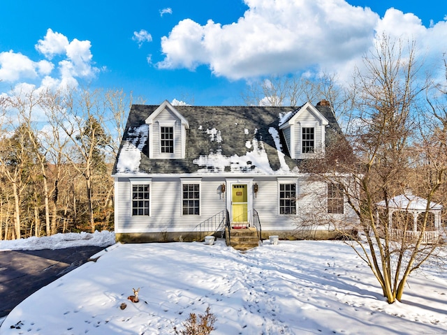 view of new england style home