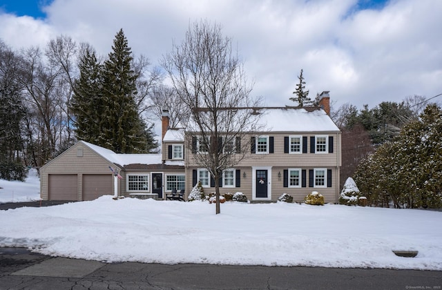 colonial home featuring a garage