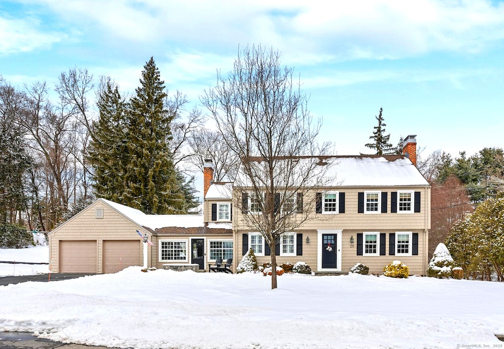 colonial home featuring a garage